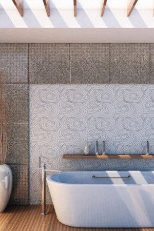 Handyman fitting bathroom suite in a Suffolk home
