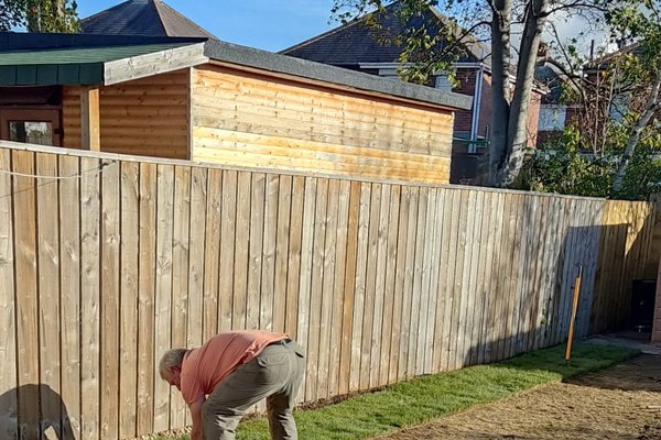 Tree surgeon working in a Suffolk garden
